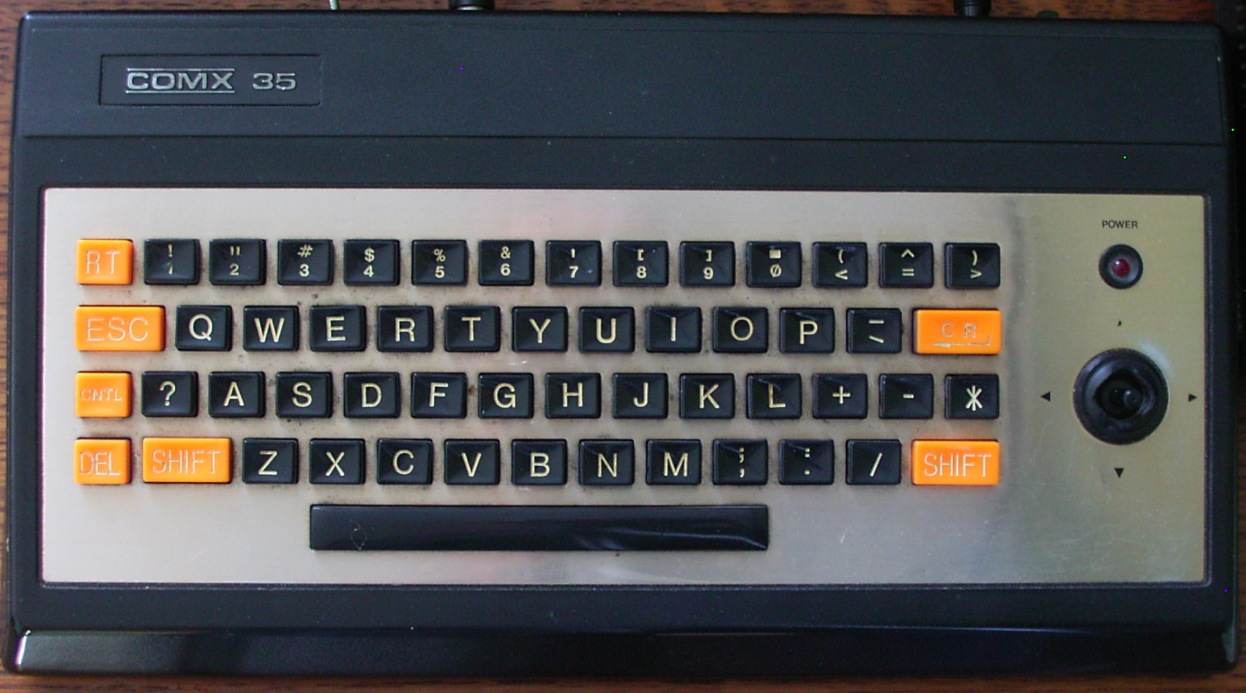 COMX-35 home computer with built-in joystick